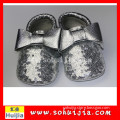 Free size wholesale tongxiang silver big bow moccasins cow leather soft flat baby shoes handmade